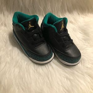 Black, green and gold Jordan’s